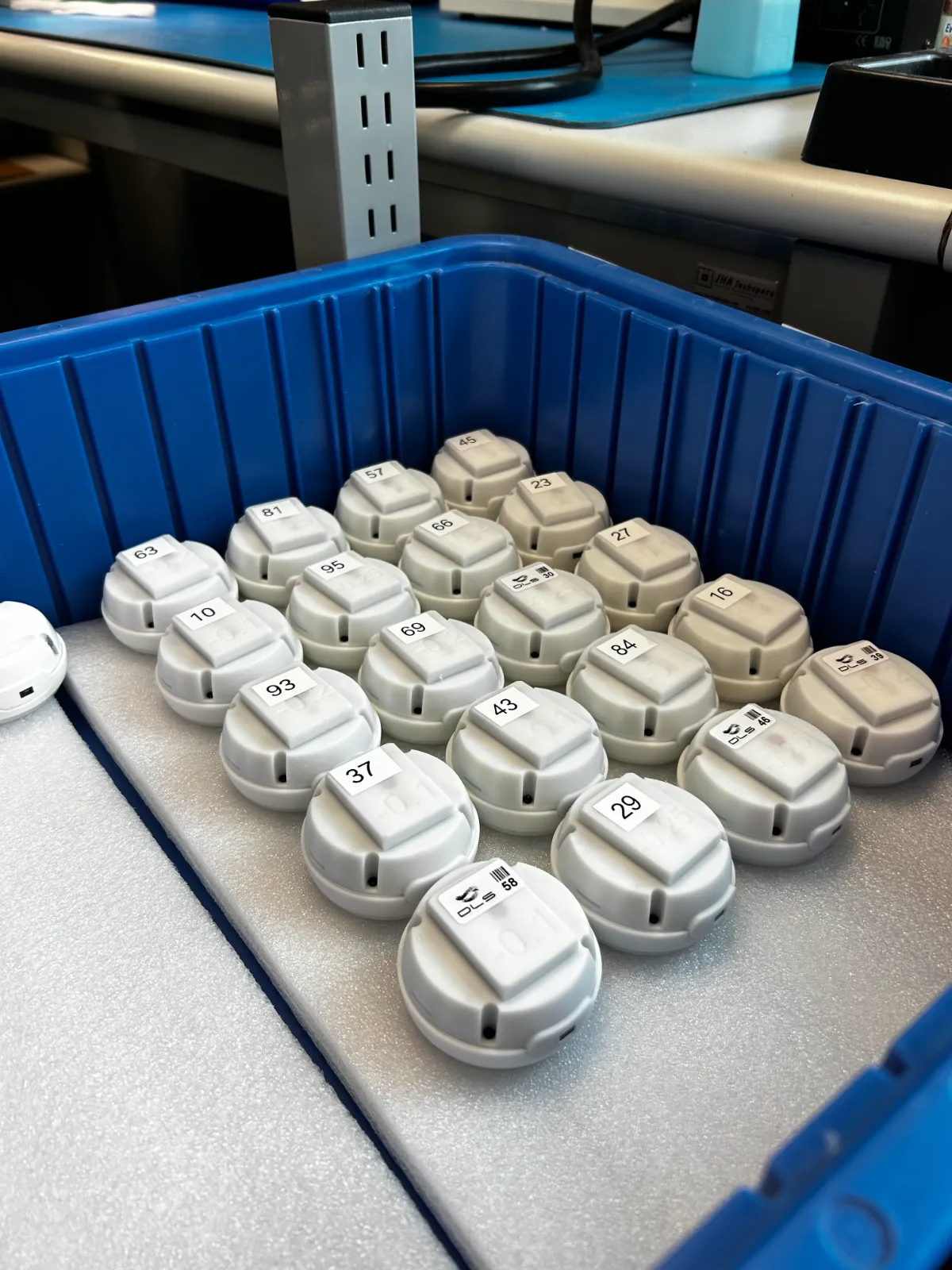 A tray of finished AQOIR sensor lids